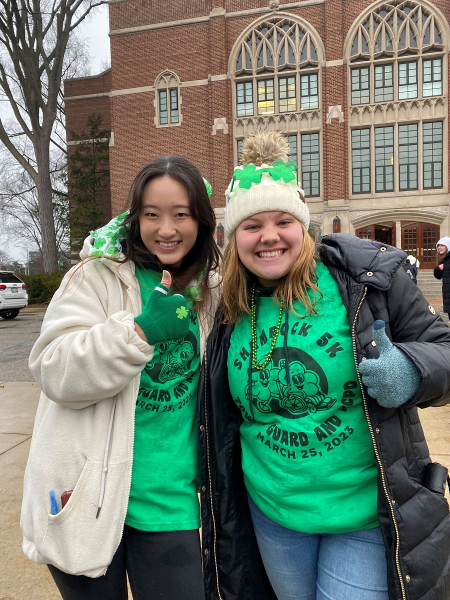 Tower Guard Members volunteering at the race giving thumbs up