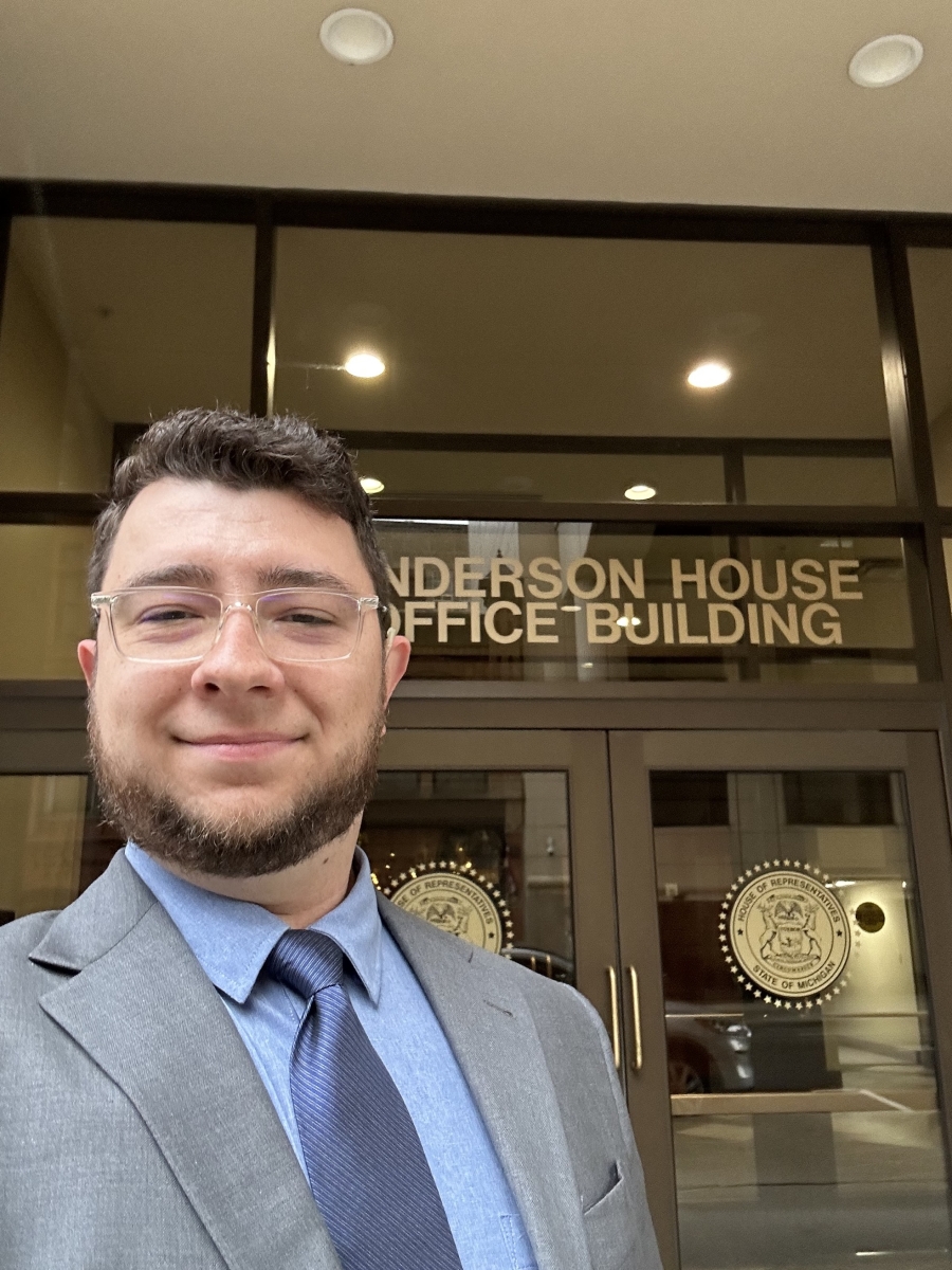 Photo of Tyler Smeltekop standing in front of the House of Representatives Building prior to the hearing.