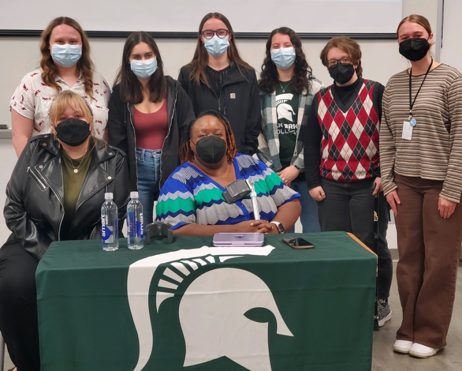 The 2023-2024 Council of Students of Disability E-Board and Advisor, Colleen Floyd in a group photo with Imani Barbarin 